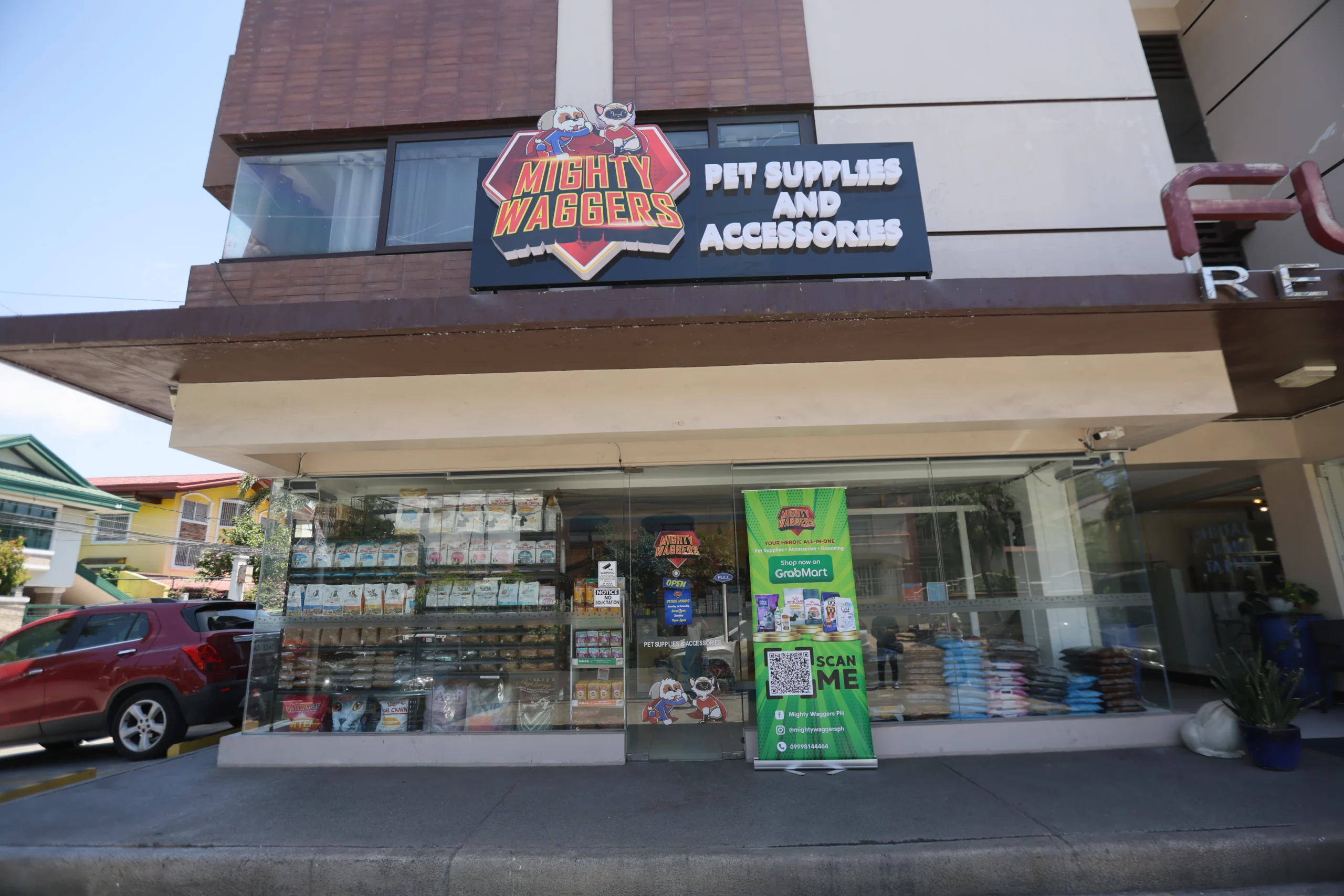 Mighty Waggers supplies shop exterior with signage